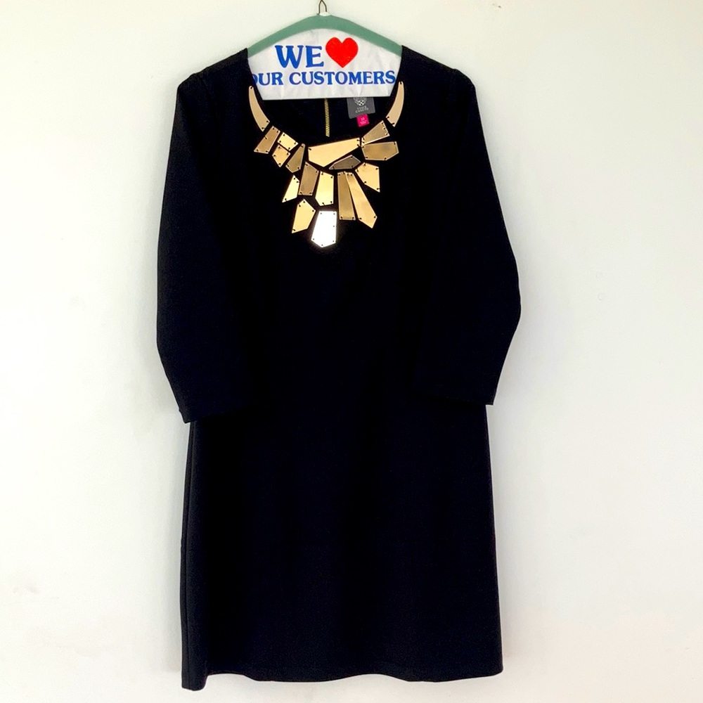 Vince Camuto black shift dress with gold plated neckline detail. Size 10.